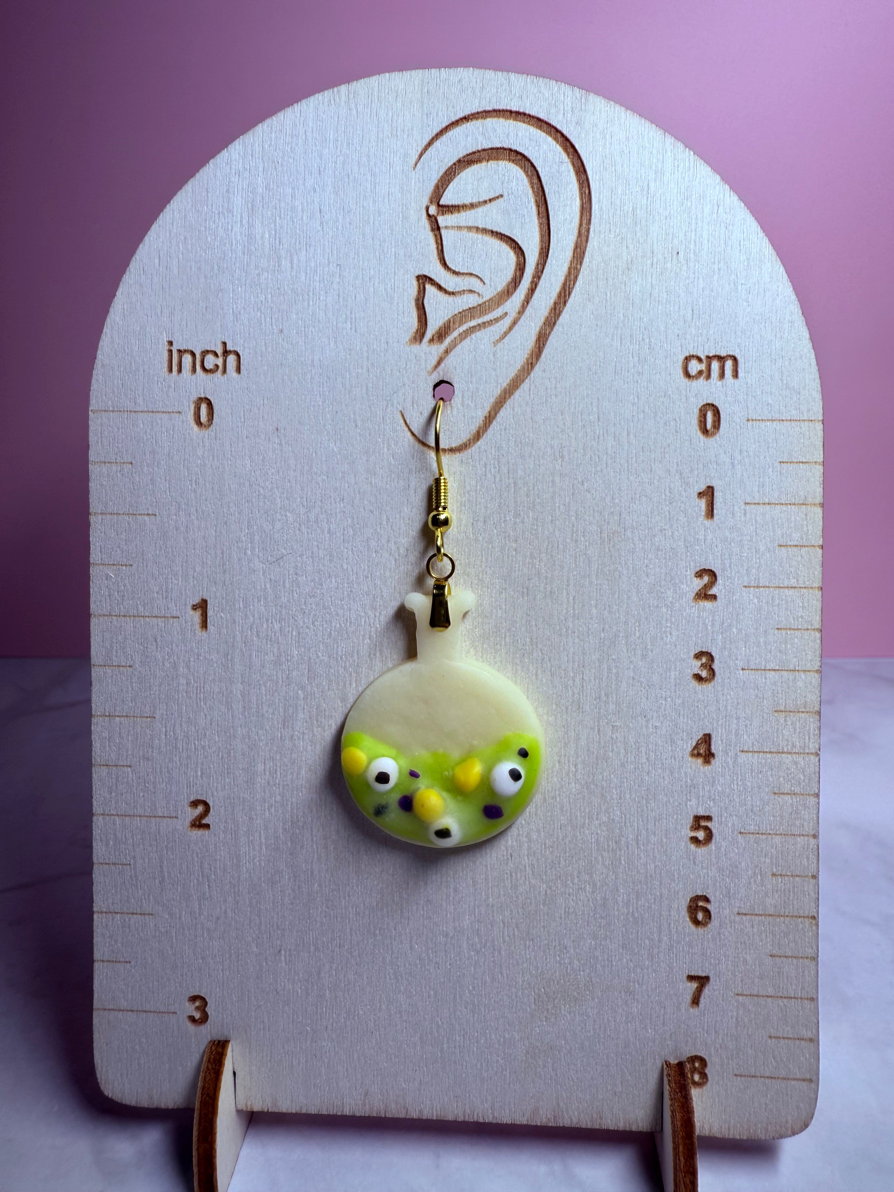 Glow-in-the-Dark Green Potion Bottle Earrings in Gold