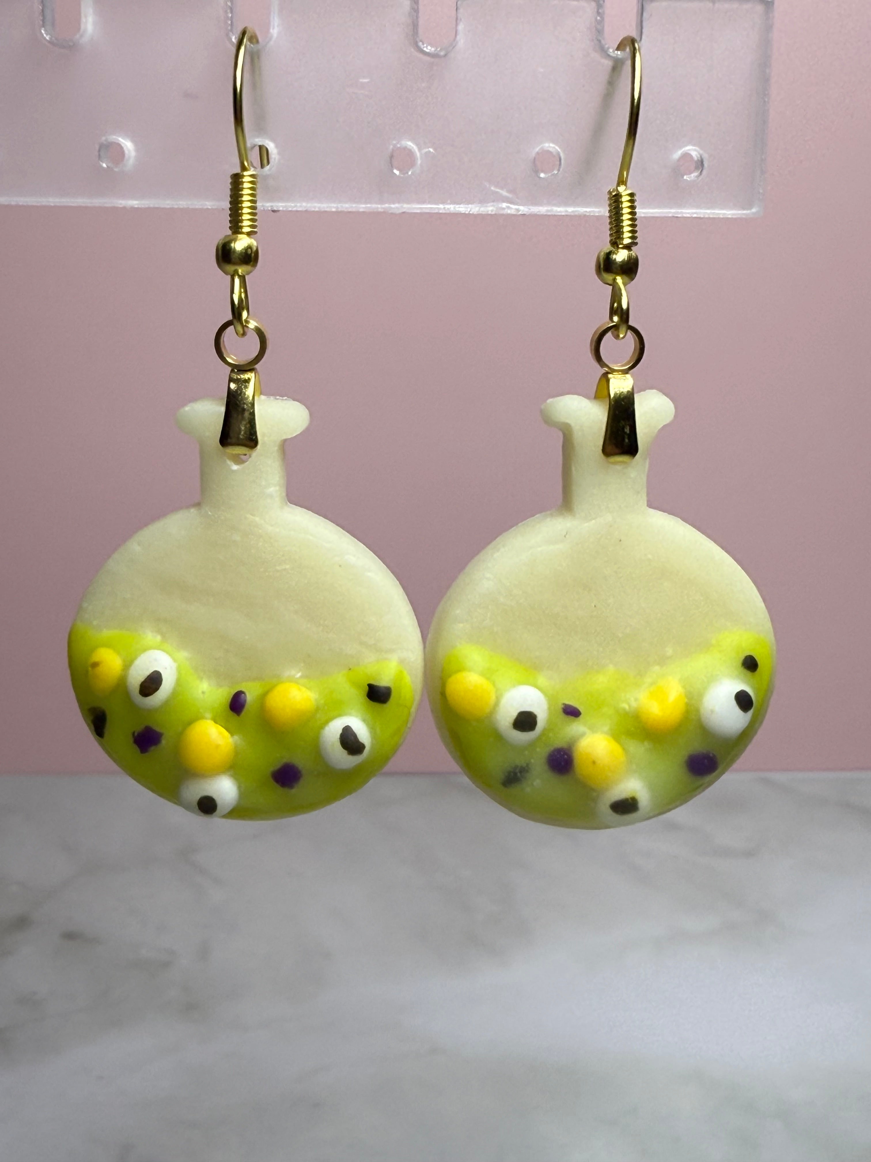 Glow-in-the-Dark Green Potion Bottle Earrings in Gold